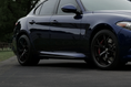 Load image into Gallery viewer, CARBON FIBER "QV STYLE" SIDE SKIRT TRIM PIECES (ALFA ROMEO GIULIA 2.0L)
